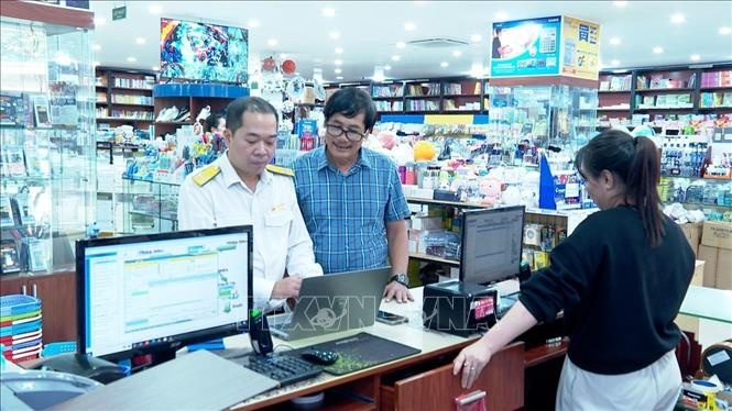Sẽ giảm 30% thuế thu nhập cho HKD, doanh nghiệp nhỏ có doanh thu dưới 10 tỷ đồng- Ảnh 1.